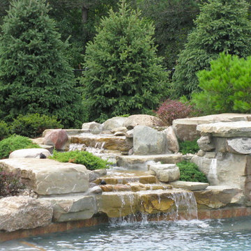 Stone Fountain with Evergreen Backdrop