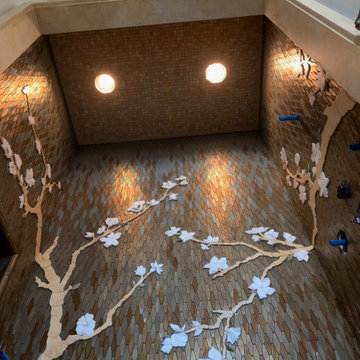 Custom glass mosaic and marble cherry tree shower