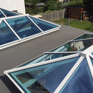 Kitchen diner flat roof extension with roof lanterns