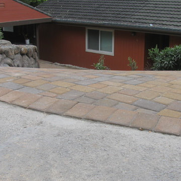 Paver driveway with Sonoma field stone retaining wall