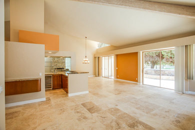 Inspiration for a mid-sized timeless open concept travertine floor and beige floor family room remodel in Other with beige walls, a standard fireplace, a stone fireplace and no tv