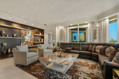 This is an example of a modern living room in Tampa with porcelain flooring and beige floors.