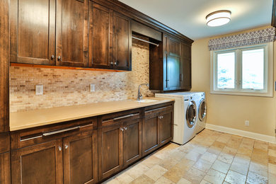 Transitional laundry room photo in Minneapolis