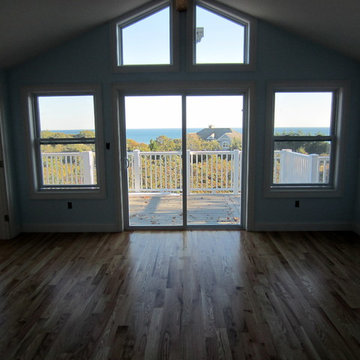 MONTAUK NEW CONSTRUCTION: 3 1/4" #1 RED OAK INSTALLED AND FINISHED NATURAL!