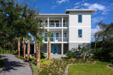 Home design - large coastal home design idea in Jacksonville