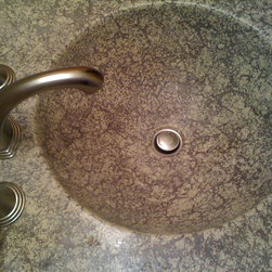 Concrete counter with integral sink. - Bath Products