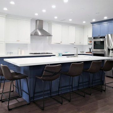 Two tone white and blue kitchen design.