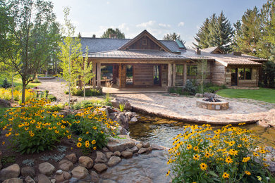 Mountain style home design photo in Denver