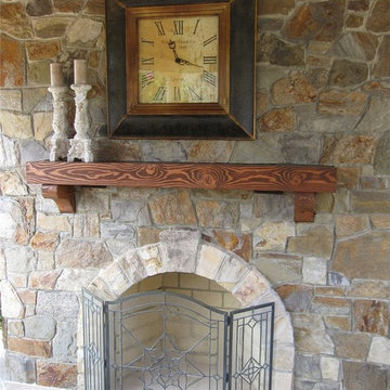 Outdoor Stone Fireplace w arched opening and keystone