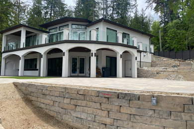 Example of a tuscan exterior home design in Vancouver