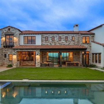 Contemporary Italian Farmhouse by John Siemering Homes Austin TX