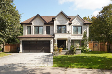 Mid-sized trendy two-story house exterior photo in Toronto