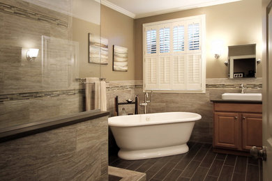 Design ideas for a large transitional master bathroom in Other with raised-panel cabinets, medium wood cabinets, a freestanding tub, an open shower, brown tile, porcelain tile, beige walls, porcelain floors and a drop-in sink.