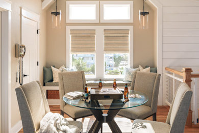 Example of a mid-sized beach style open concept medium tone wood floor and brown floor game room design in Other with beige walls