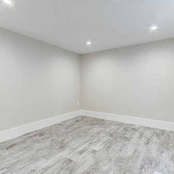 Basement remodeled with bedroom space and extra closet space in Quincy