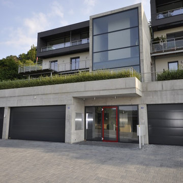 EINFAMILIENWOHNHAUS MIT EINLIEGERWOHNUNG UND TIEFGARAGE