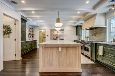 Inspiration for a large transitional dark wood floor, brown floor and coffered ceiling kitchen pantry remodel in Milwaukee with an undermount sink, recessed-panel cabinets, beige cabinets, quartz countertops, white backsplash, ceramic backsplash, stainless steel appliances and beige countertops