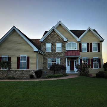 Cobble Stone Hardie Plank and ProVia Ledgestone Siding Installation in Lincoln U