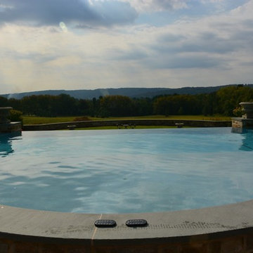 Infinity edge pool with underground grotto