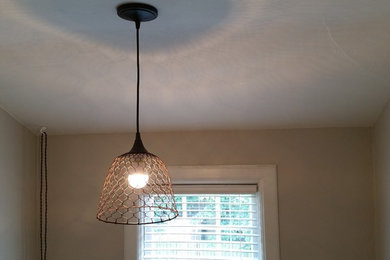 Example of a mid-sized classic guest bedroom design in Portland with beige walls