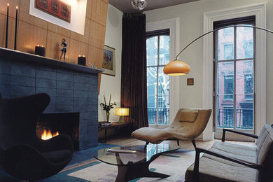 Photo of a small contemporary loft-style living room in New York.