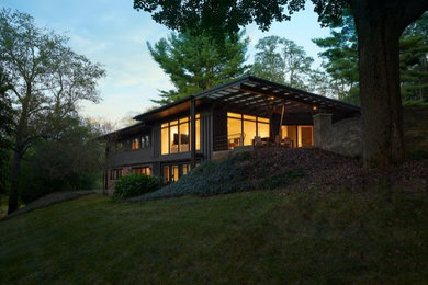 Inspiration for a mid-sized modern two-story exterior home remodel in Grand Rapids