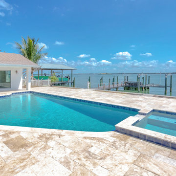 Waterfront Pool House with Elegant Coastal Charm