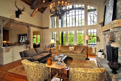 Living room - rustic living room idea in Charlotte