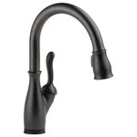 Delta - Delta Leland Pull-Down Kitchen Faucet, Touch2O, ShieldSpray, Venetian Bronze - Touch it on. Touch it off. Whether you have two full hands or 10 messy fingers, Delta Touch2O Technology helps keep your faucet clean, even when your hands aren�t. A simple touch anywhere on the spout or handle with your wrist or forearm activates the flow of water at the temperature where your handle is set. The Delta TempSense LED light changes color to alert you to the water�s temperature and eliminate any possible surprises or discomfort. Delta MagnaTite Docking uses a powerful integrated magnet to pull your faucet spray wand precisely into place and hold it there so it stays docked when not in use. Delta ShieldSpray Technology cleans with laser-like precision while containing mess and splatter. A concentrated jet powers away stubborn messes while an innovative shield of water contains splatter and clears off the mess, so you can spend less time soaking, scrubbing and shirt swapping. Delta faucets with DIAMOND Seal Technology perform like new for life with a patented design which reduces leak points, is less hassle to install and lasts twice as long as the industry standard*. Kitchen faucets with Touch-Clean Spray Holes allow you to easily wipe away calcium and lime build-up with the touch of a finger. You can install with confidence, knowing that Delta faucets are backed by our Lifetime Limited Warranty. Electronic parts are backed by our 5-year electronic parts warranty.  *Industry standard is based on ASME A112.18.1 of 500,000 cycles.