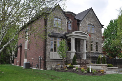 Example of a minimalist exterior home design in Toronto