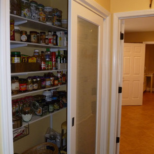 Small contemporary kitchen pantry ideas - Kitchen pantry - small contemporary galley dark wood floor kitchen pantry idea in Nashville