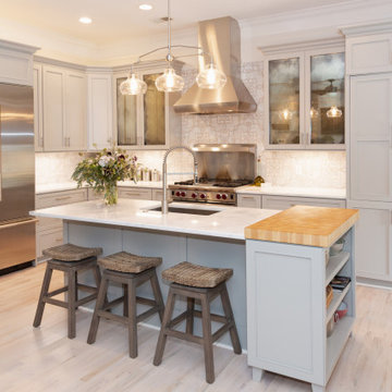 Tall cabinet are the anchors at the ends of this classic kitchen