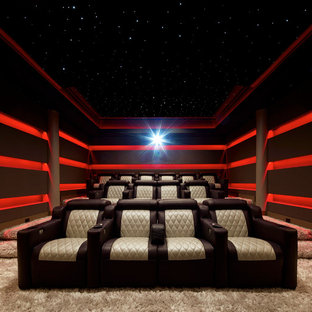 Design ideas for a medium sized modern enclosed home cinema in New York with carpet, beige floors, purple walls and a built-in media unit.