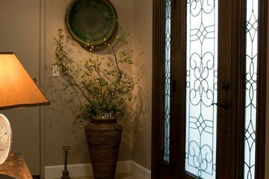 Tuscan entryway photo in San Diego