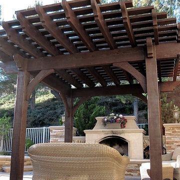 Poolside Timber Frame Pergola with Outdoor Fireplace