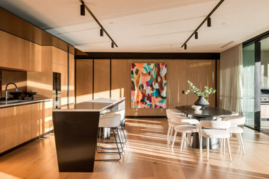 This is an example of a modern dining room in Brisbane.