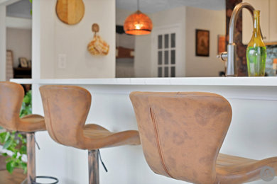 Example of a minimalist kitchen design in Other