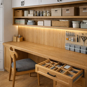 Custom Hobby Closet With Built-In Desk and Organized Drawer Storage