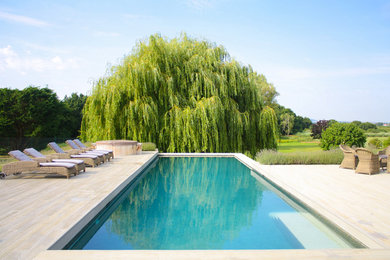 Inspiration for a traditional pool in Sussex.