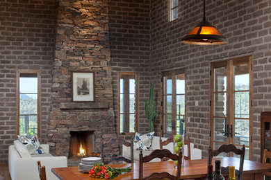 Open concept kitchen - large craftsman u-shaped medium tone wood floor open concept kitchen idea in Phoenix with granite countertops, an island, an undermount sink, shaker cabinets, medium tone wood cabinets and stainless steel appliances