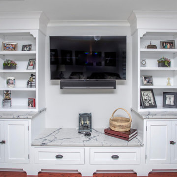 Custom kitchen, dining room, entertainment center and laundry.