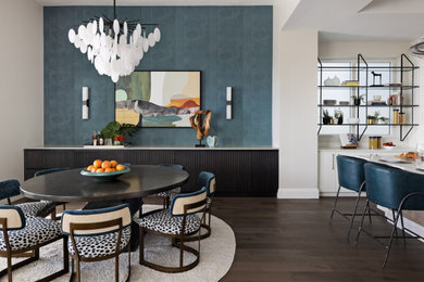 Inspiration for a transitional dark wood floor and brown floor dining room remodel in Tampa with blue walls