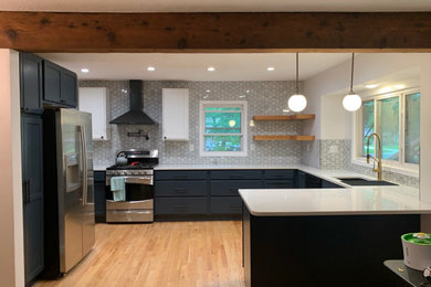 Inspiration for a mid-sized modern u-shaped light wood floor and exposed beam eat-in kitchen remodel in Other with a single-bowl sink, shaker cabinets, blue cabinets, quartzite countertops, gray backsplash, marble backsplash, stainless steel appliances, a peninsula and white countertops