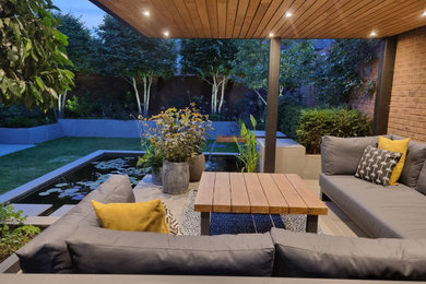 This is an example of a contemporary patio in Gloucestershire.