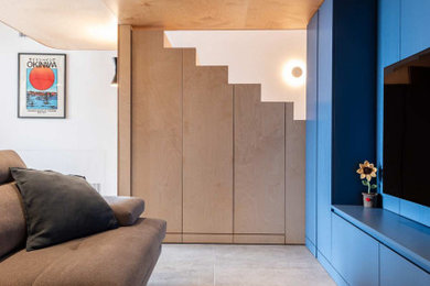 Foto di un soggiorno design aperto con pareti blu, pavimento in gres porcellanato, pavimento grigio e soffitto in legno