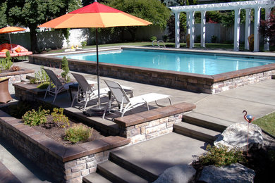 Design ideas for a contemporary pool in Seattle.