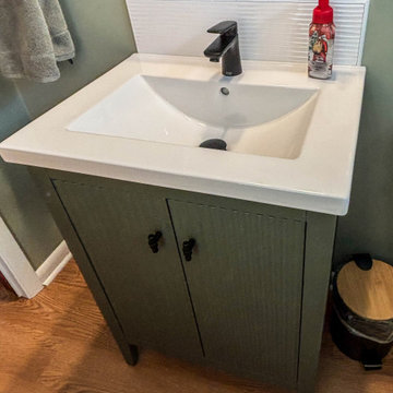Powder Room with Linear Vintage Green Vanity with White Ceramic Countertop