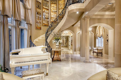 Example of a large classic formal and open concept marble floor living room design in Other with beige walls and no tv