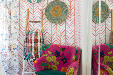 Mid-sized eclectic guest carpeted bedroom photo in Kansas City with red walls