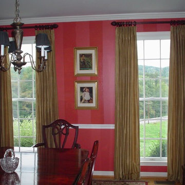 Gold pinch pleated drapes